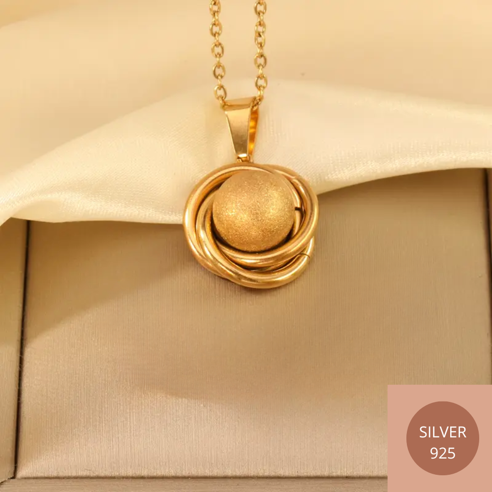 Pendentif perle brune
